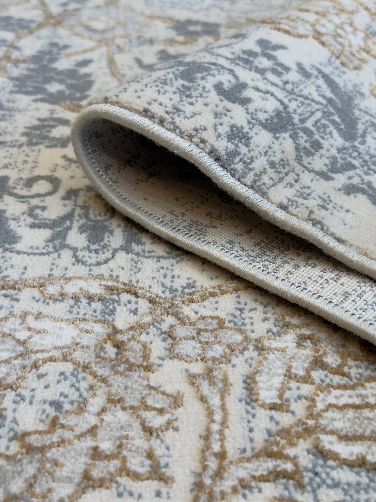 Nourison Astra Beige, Gray & Gold Tone Washable Rug - Size (6.7x9.6)ft