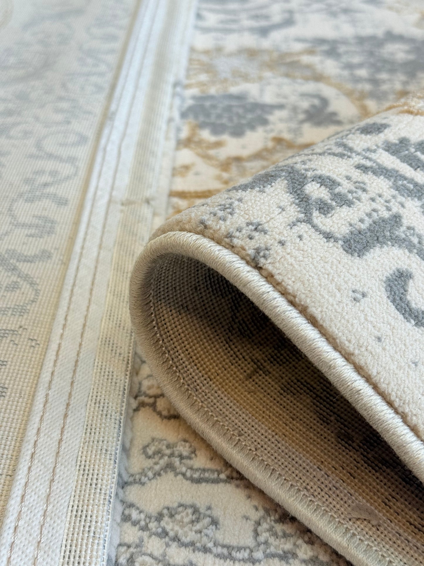 Nourison Astra Beige, Gray & Gold Tone Washable Rug - Size (6.7x9.6)ft