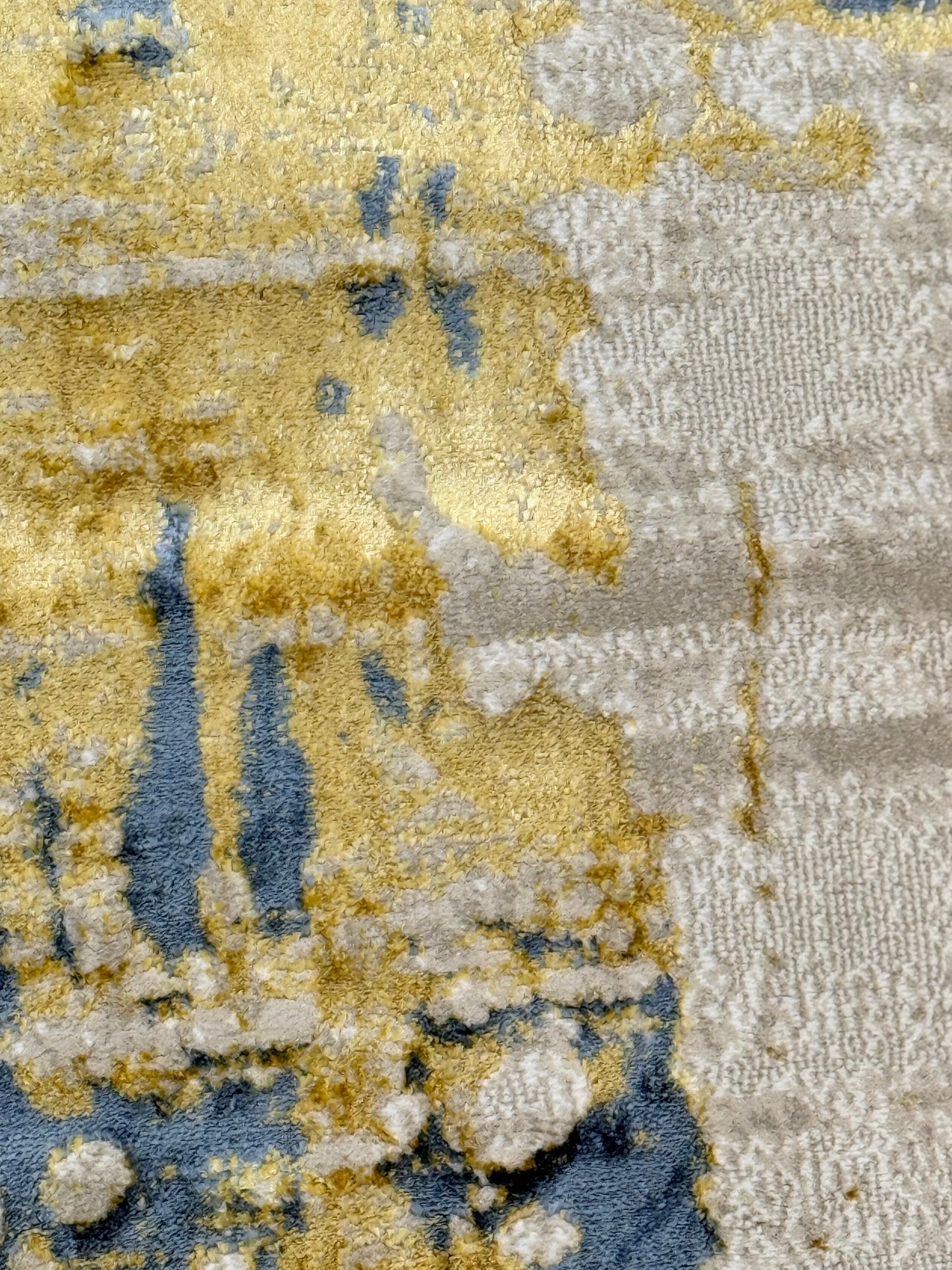 The Modern Abstract Rug in shades of Grey, Beige , Blue and Gold is sized 150x220 cm (4.11 x 7.3 ft)