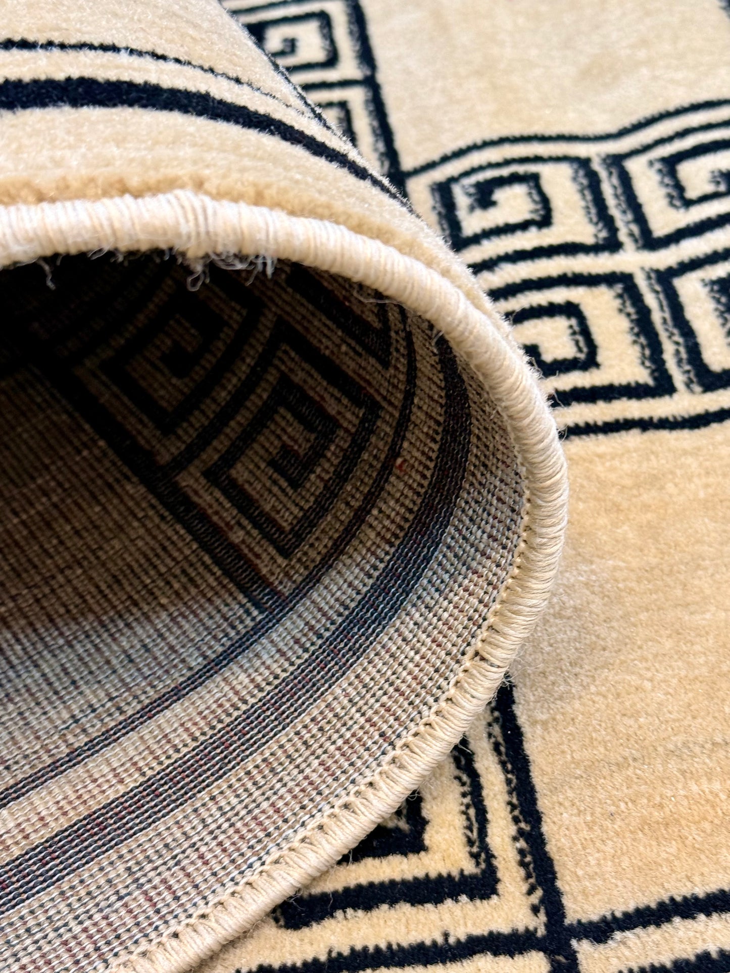 This Geometric Greek Key Area Rug | Black and Beige color palette | Size 4x6 feet.