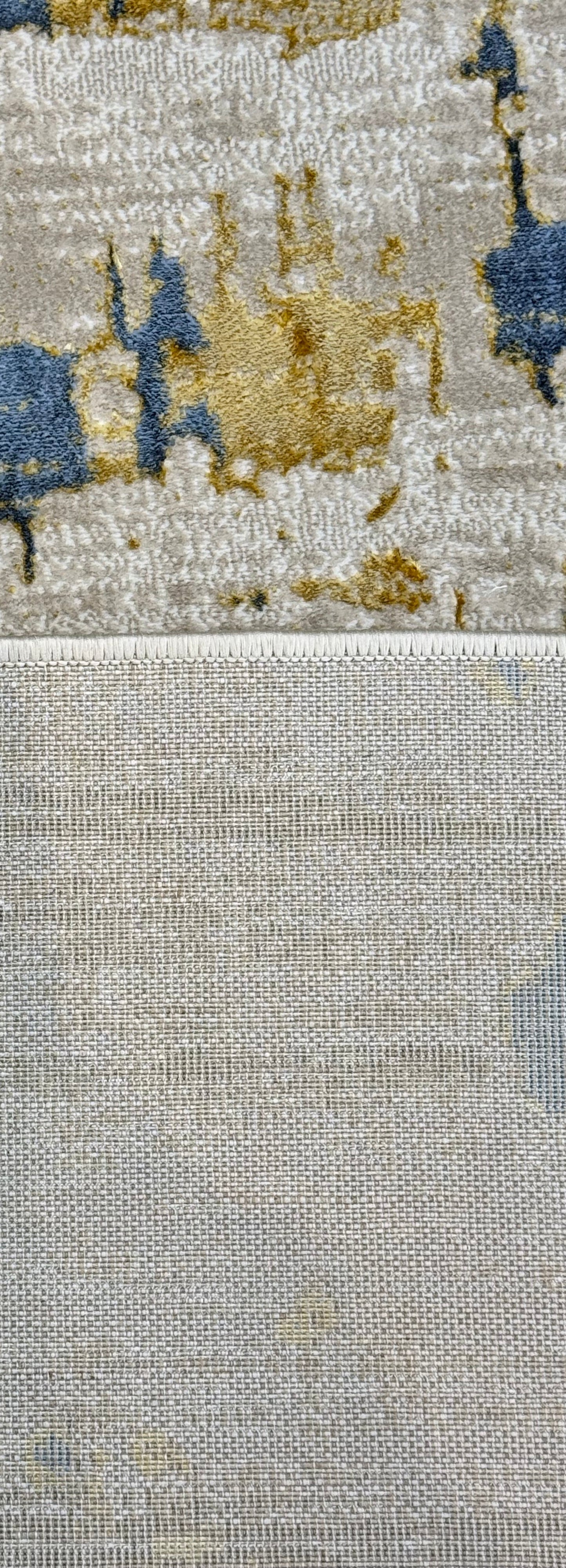 The Modern Abstract Rug in shades of Grey, Beige , Blue and Gold is sized 150x220 cm (4.11 x 7.3 ft)