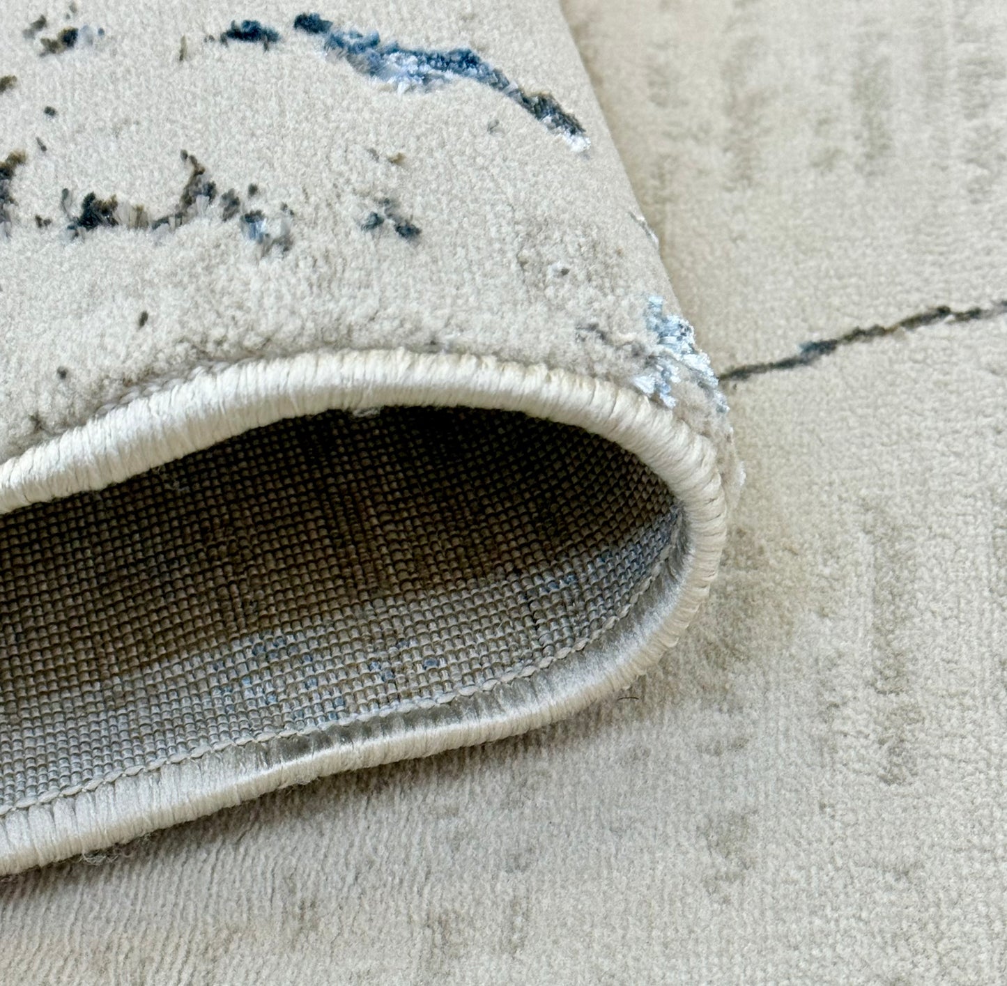 Distressed Abstract Marble Rug in shades of grey, cream & charcoal | Size 150x220cm (4.11x7.2 ft)